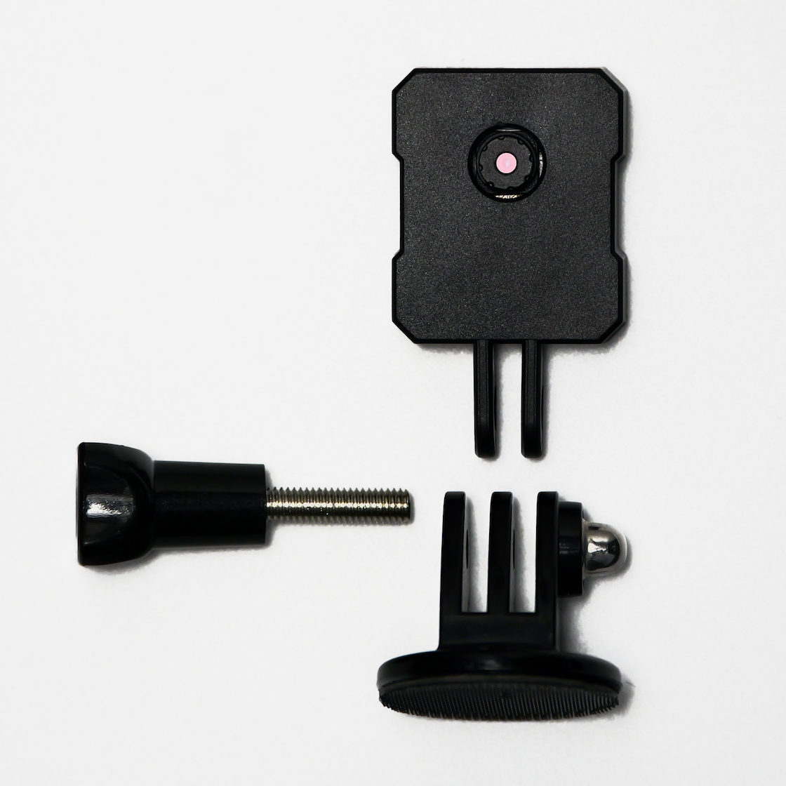 Black camera mount components on a white background